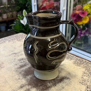 Vintage swirling pattern ceramic jug